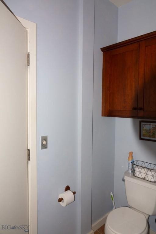 202 Beach Dr, West Yellowstone, MT 59758 - bathroom with toilet and baseboards
