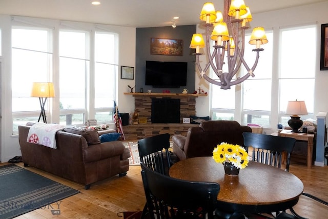 202 Beach Dr, West Yellowstone, MT 59758 - dining space with a chandelier, healthy amount of natural light, wood finished floors, and recessed lighting