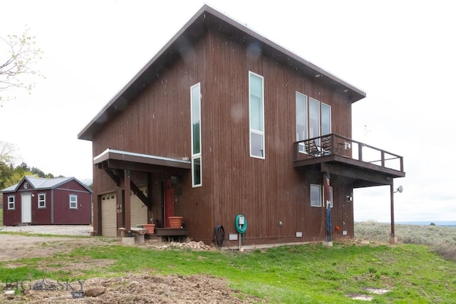 202 Beach Dr, West Yellowstone, MT 59758 - view of side of home featuring a balcony