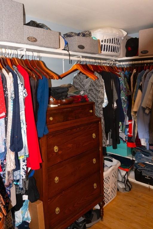 202 Beach Dr, West Yellowstone, MT 59758 - spacious closet featuring wood finished floors