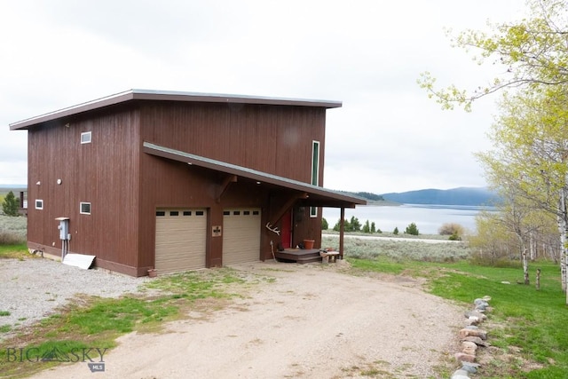 202 Beach Dr, West Yellowstone, MT 59758 - view of outdoor structure featuring a water view