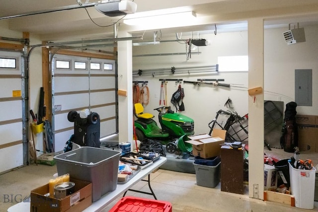202 Beach Dr, West Yellowstone, MT 59758 - garage with electric panel and a garage door opener