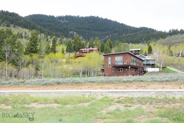 202 Beach Dr, West Yellowstone, MT 59758 - view of mountain backdrop with a heavily wooded area