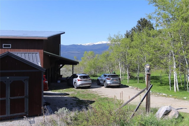 202 Beach Dr, West Yellowstone, MT 59758 - view of street with a mountain view