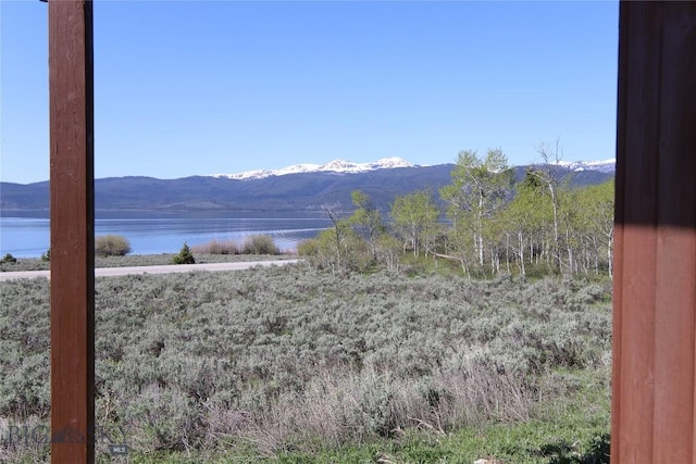 202 Beach Dr, West Yellowstone, MT 59758 - view of mountain backdrop featuring a large body of water