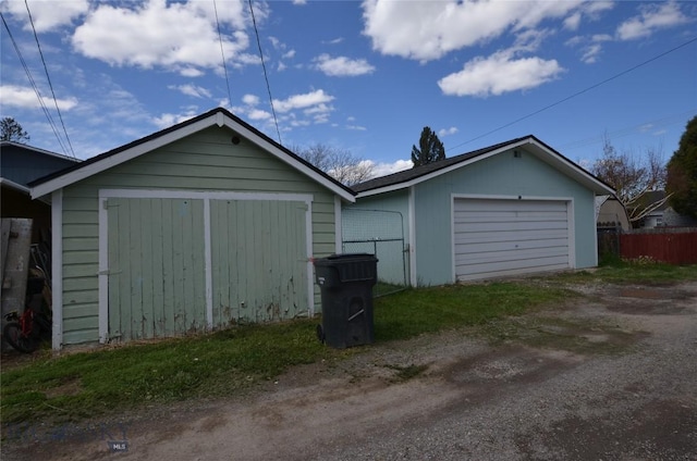 314 S Dakota St, Dillon, MT 59725 - detached garage featuring driveway