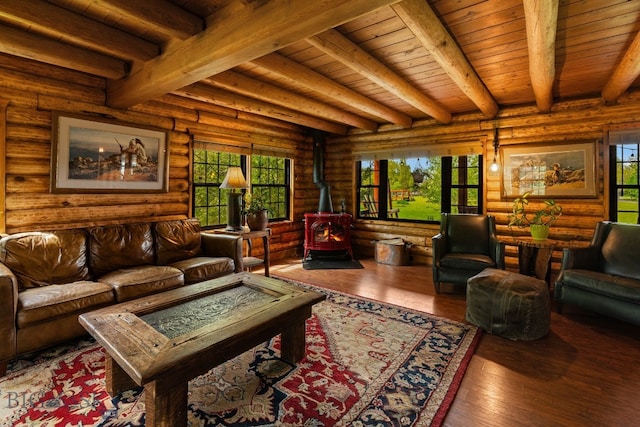 25 Big Chief Trl, Bozeman, MT 59718 - living room featuring a wood stove, a wood ceiling with exposed beams, hardwood / wood-style floors, and log walls