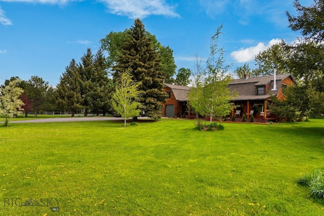 25 Big Chief Trl, Bozeman, MT 59718 - view of grassy yard with covered porch