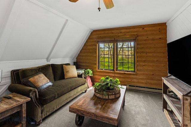 25 Big Chief Trl, Bozeman, MT 59718 - living area with a baseboard radiator, rustic walls, a ceiling fan, lofted ceiling, and carpet flooring