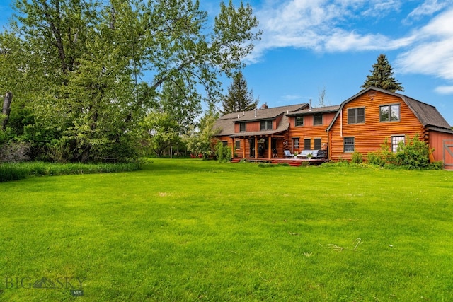25 Big Chief Trl, Bozeman, MT 59718 - view of grassy yard featuring a deck