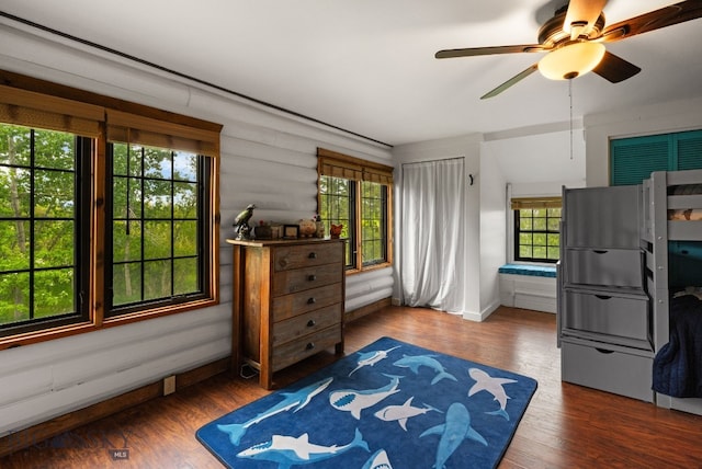 25 Big Chief Trl, Bozeman, MT 59718 - bedroom with multiple windows and wood finished floors