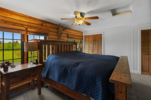 25 Big Chief Trl, Bozeman, MT 59718 - carpeted bedroom featuring log walls