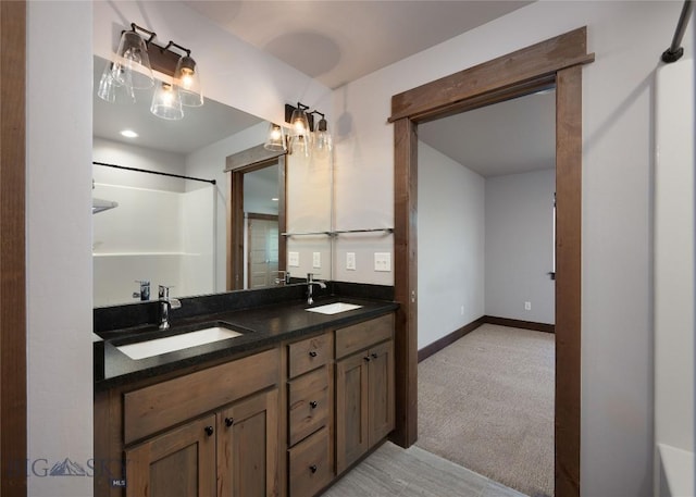 1304 Glider Ln Unit B, Belgrade, MT 59714 - full bath featuring double vanity and baseboards