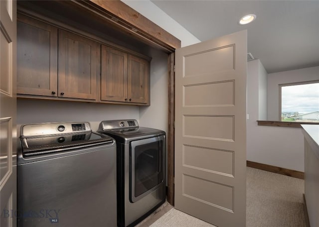 1304 Glider Ln Unit B, Belgrade, MT 59714 - laundry area with cabinet space, separate washer and dryer, carpet flooring, baseboards, and recessed lighting