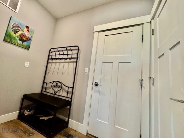 920 Butler Creek Ave, Belgrade, MT 59714 - entryway with baseboards and wood finished floors