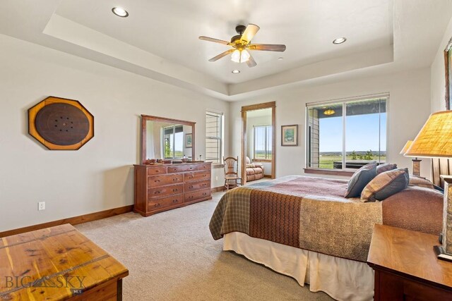 43 Lewis Dr, Three Forks, MT 59752 - bedroom featuring a raised ceiling, multiple windows, carpet, baseboards, and recessed lighting