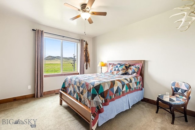 43 Lewis Dr, Three Forks, MT 59752 - bedroom with light carpet, baseboards, and a ceiling fan
