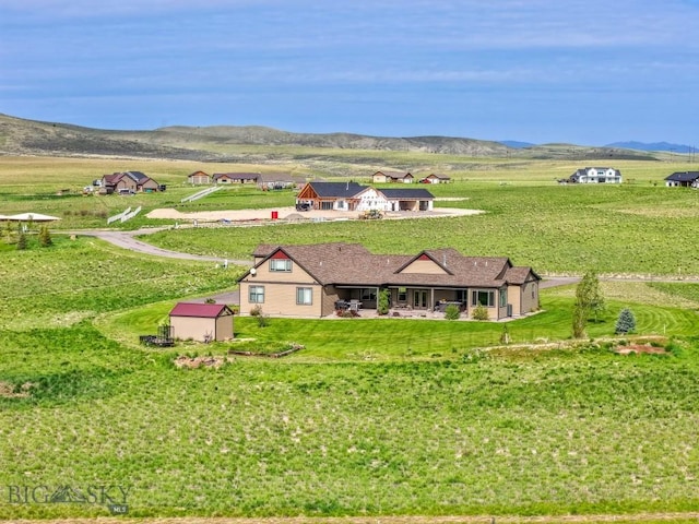 43 Lewis Dr, Three Forks, MT 59752 - aerial view of sparsely populated area featuring a mountain backdrop