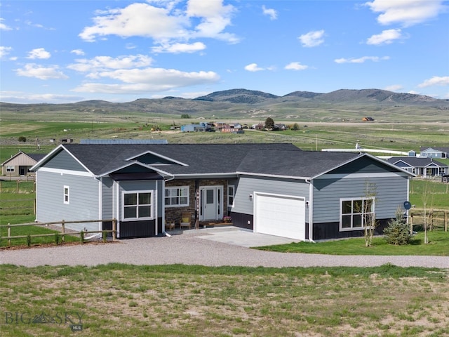 6 Wild Rye Pl, Three Forks, MT 59752 - single story home featuring an attached garage, a mountain view, and driveway