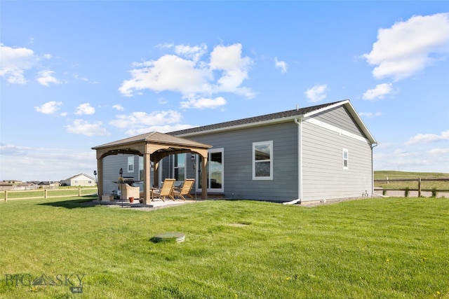 6 Wild Rye Pl, Three Forks, MT 59752 - back of property with a gazebo and a patio area