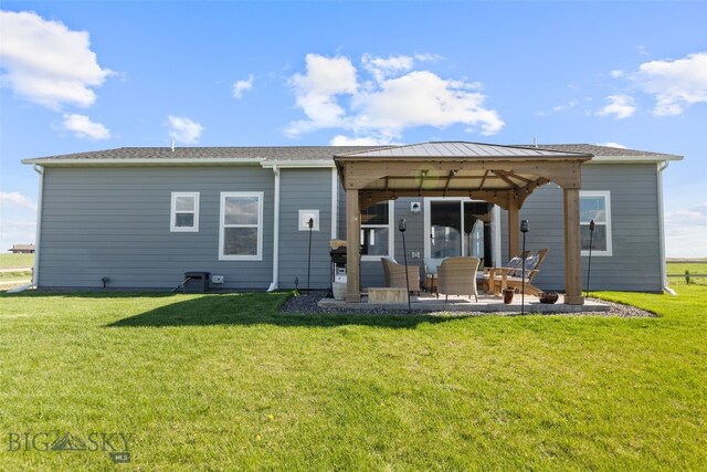 6 Wild Rye Pl, Three Forks, MT 59752 - rear view of property featuring a patio area, a gazebo, a lawn, and an outdoor living space