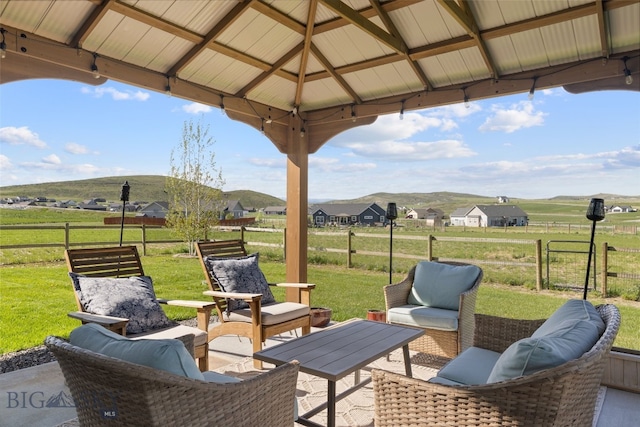 6 Wild Rye Pl, Three Forks, MT 59752 - view of patio / terrace with a mountain view, an outdoor living space, and a gazebo