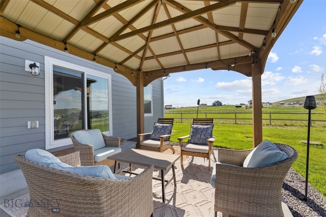 6 Wild Rye Pl, Three Forks, MT 59752 - view of patio with a gazebo, an outdoor hangout area, and a view of countryside