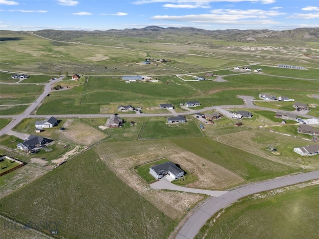 6 Wild Rye Pl, Three Forks, MT 59752 - aerial view of property and surrounding area with mountains