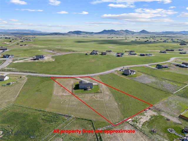 6 Wild Rye Pl, Three Forks, MT 59752 - overview of rural landscape featuring property boundaries highlighted and a mountain backdrop