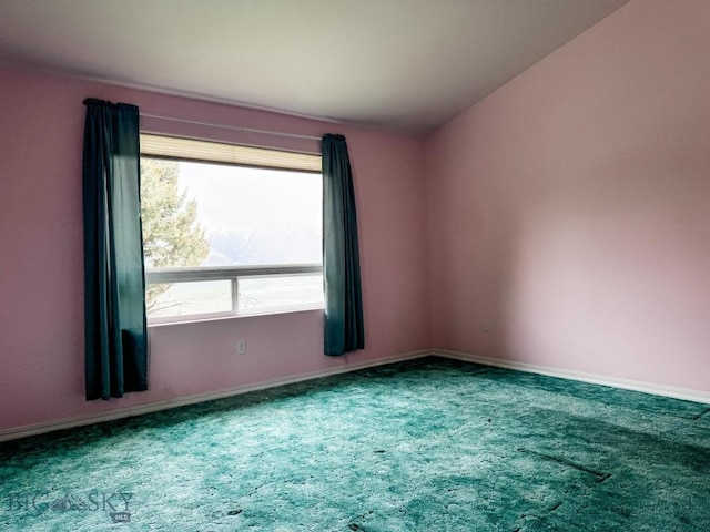 263 Hercules Rd, Emigrant, MT 59027 - carpeted empty room featuring baseboards and vaulted ceiling