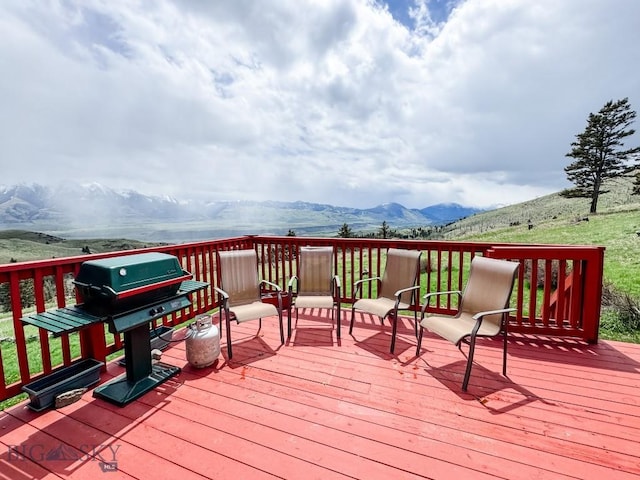 263 Hercules Rd, Emigrant, MT 59027 - deck with a mountain view and area for grilling