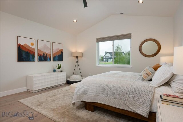 1510 Windrow Dr, Bozeman, MT 59718 - bedroom with lofted ceiling, wood finished floors, baseboards, recessed lighting, and ceiling fan