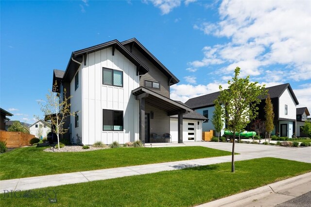1510 Windrow Dr, Bozeman, MT 59718 - modern farmhouse with board and batten siding, concrete driveway, and a garage