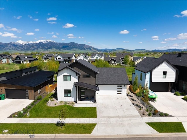 1510 Windrow Dr, Bozeman, MT 59718 - modern farmhouse style home featuring a residential view, board and batten siding, a mountain view, and a garage