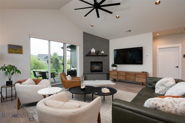 1510 Windrow Dr, Bozeman, MT 59718 - living area with light wood-style floors, high vaulted ceiling, ceiling fan, recessed lighting, and a fireplace