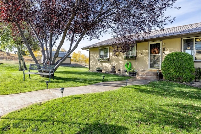 34 Mammoth, Butte, MT 59701 - view of front facade with a front yard and metal roof