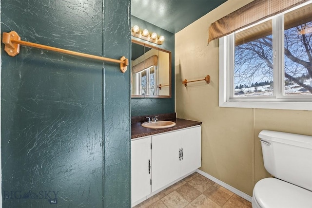 34 Mammoth, Butte, MT 59701 - bathroom with toilet, vanity, and baseboards