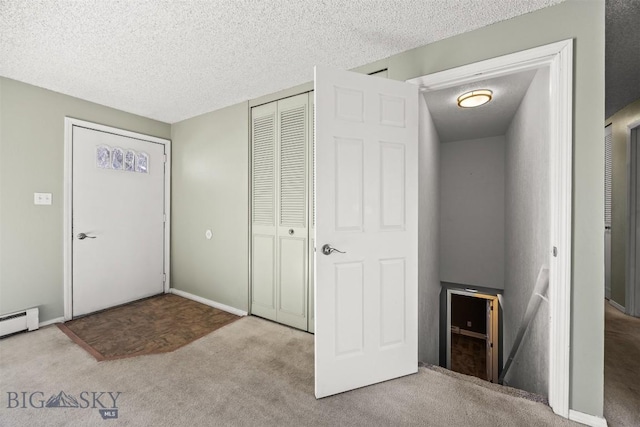 34 Mammoth, Butte, MT 59701 - foyer entrance featuring carpet and a textured ceiling