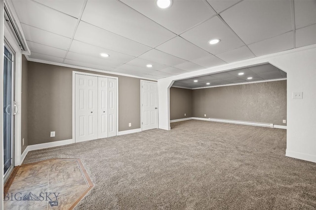 34 Mammoth, Butte, MT 59701 - below grade area featuring carpet, baseboards, recessed lighting, a paneled ceiling, and arched walkways