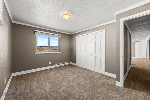 34 Mammoth, Butte, MT 59701 - unfurnished bedroom with carpet floors, baseboard heating, crown molding, a closet, and a textured wall