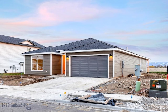 608 Spaniel Ln, Belgrade, MT 59714 - ranch-style house featuring a garage and concrete driveway