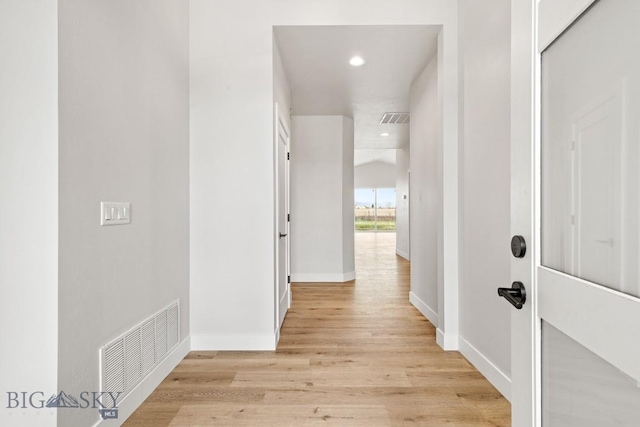608 Spaniel Ln, Belgrade, MT 59714 - hall featuring light wood finished floors, recessed lighting, and baseboards