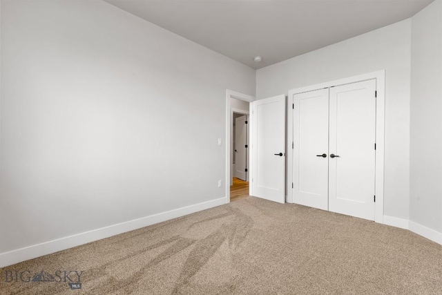 608 Spaniel Ln, Belgrade, MT 59714 - unfurnished bedroom with carpet and baseboards