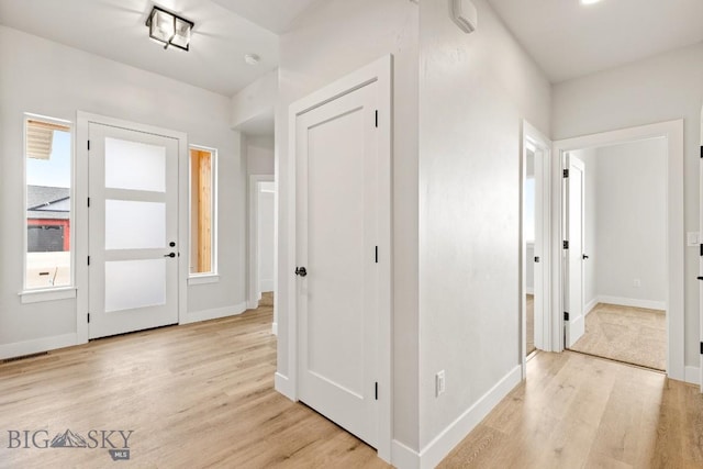 608 Spaniel Ln, Belgrade, MT 59714 - foyer entrance with light wood-style flooring and baseboards