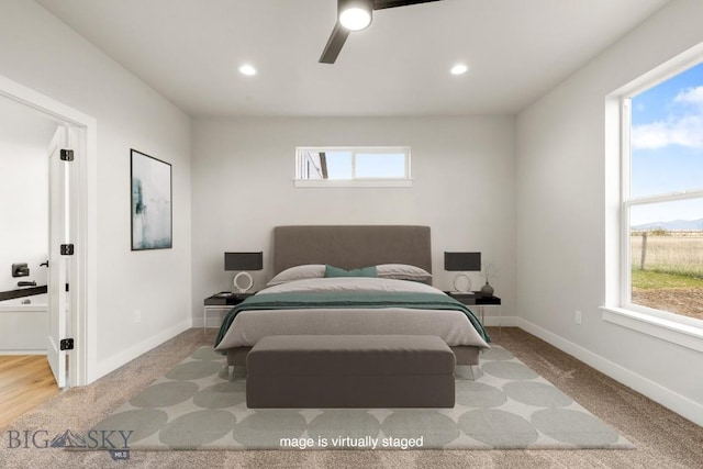 608 Spaniel Ln, Belgrade, MT 59714 - bedroom featuring carpet flooring, multiple windows, and recessed lighting