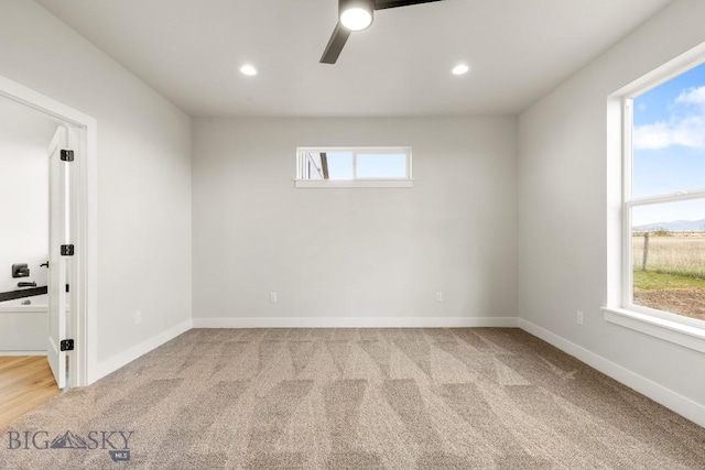 608 Spaniel Ln, Belgrade, MT 59714 - spare room with carpet floors, ceiling fan, plenty of natural light, and recessed lighting