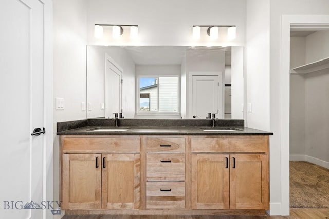 608 Spaniel Ln, Belgrade, MT 59714 - bathroom featuring double vanity