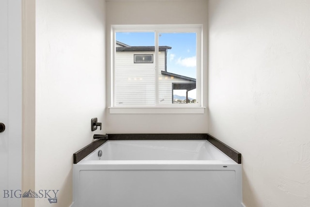 608 Spaniel Ln, Belgrade, MT 59714 - bathroom with a garden tub