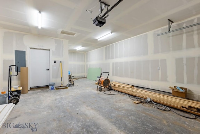 608 Spaniel Ln, Belgrade, MT 59714 - garage with electric panel and a garage door opener