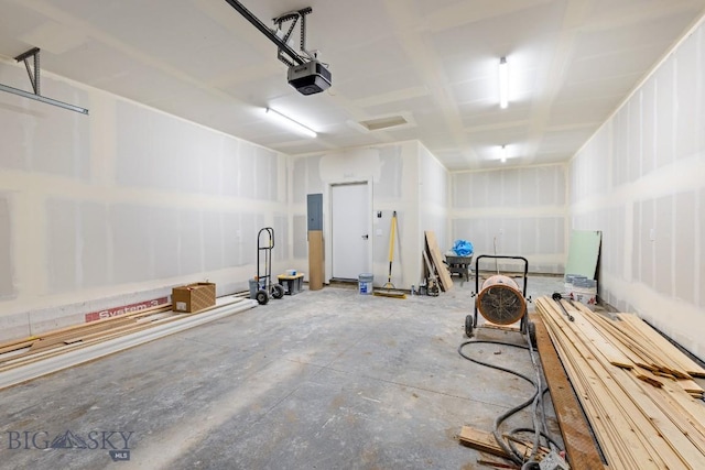 608 Spaniel Ln, Belgrade, MT 59714 - garage with a garage door opener and electric panel